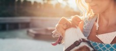Happy Woman Holding Her Dog